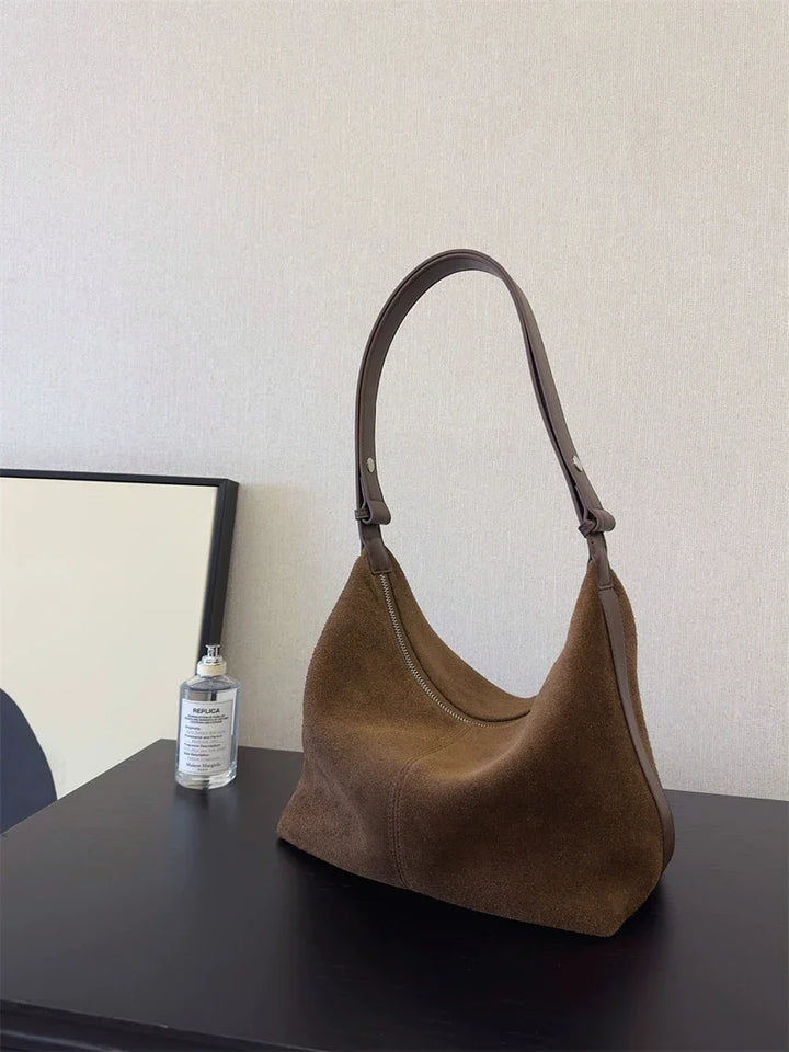 Suede bag with classic design