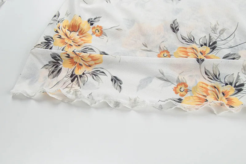 שמלת מיני שיפון פרחונית מלמלה - מרי לין