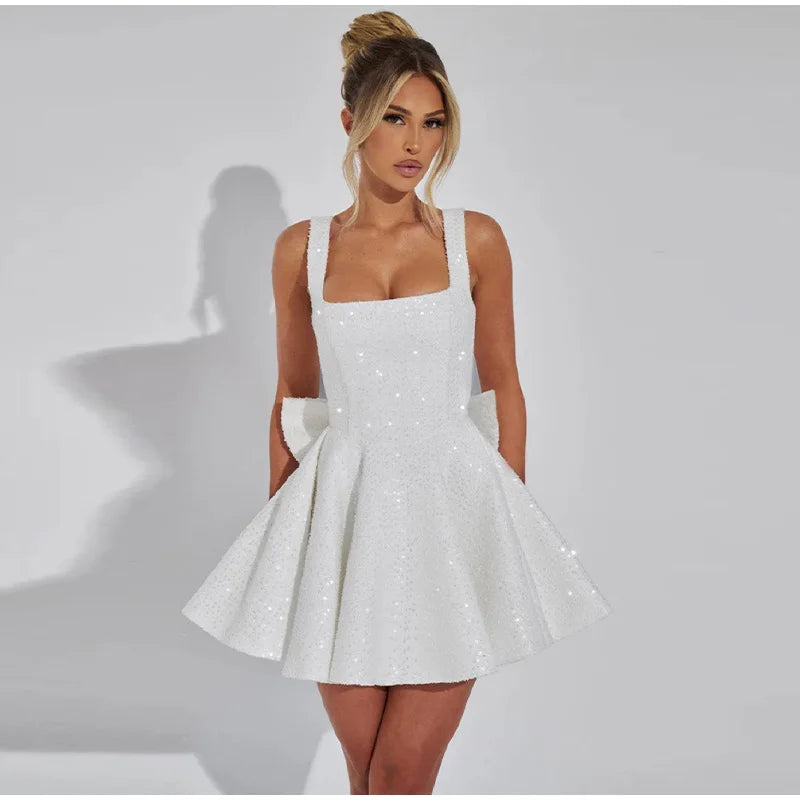 שמלת מיני פייטים בגזרת A בעיטור פפיון בגב - Alayna