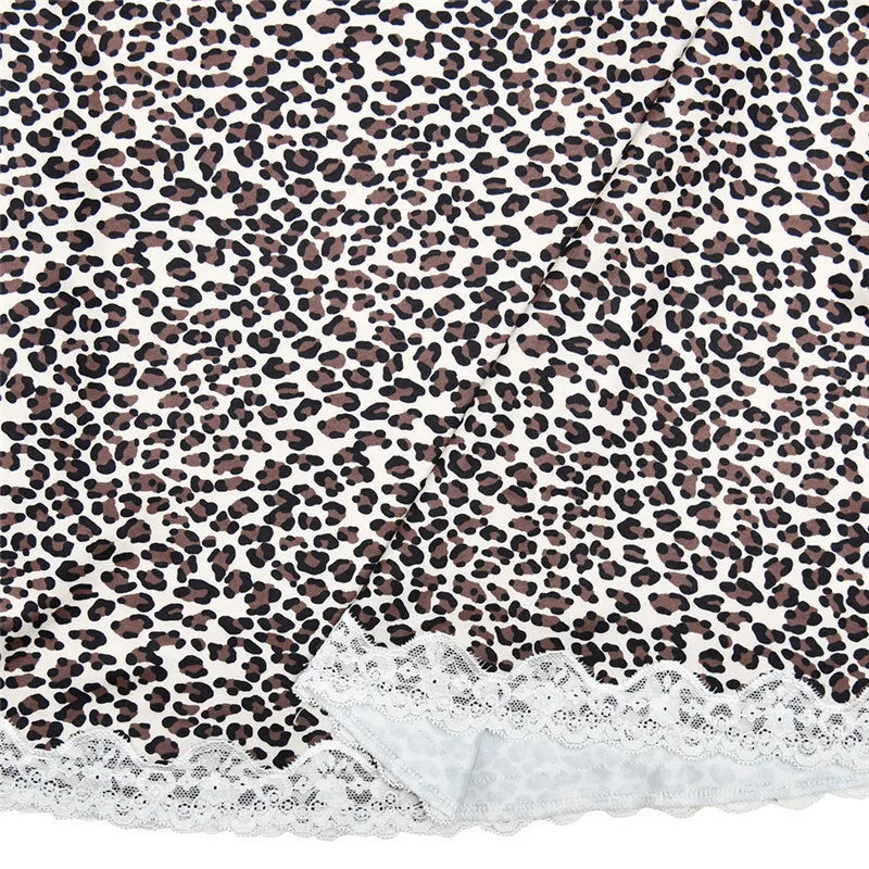 שמלת מיני מנומרת בעיצוב קשירה בצוואר וגב פתוח בעיטור תחרה - נלה