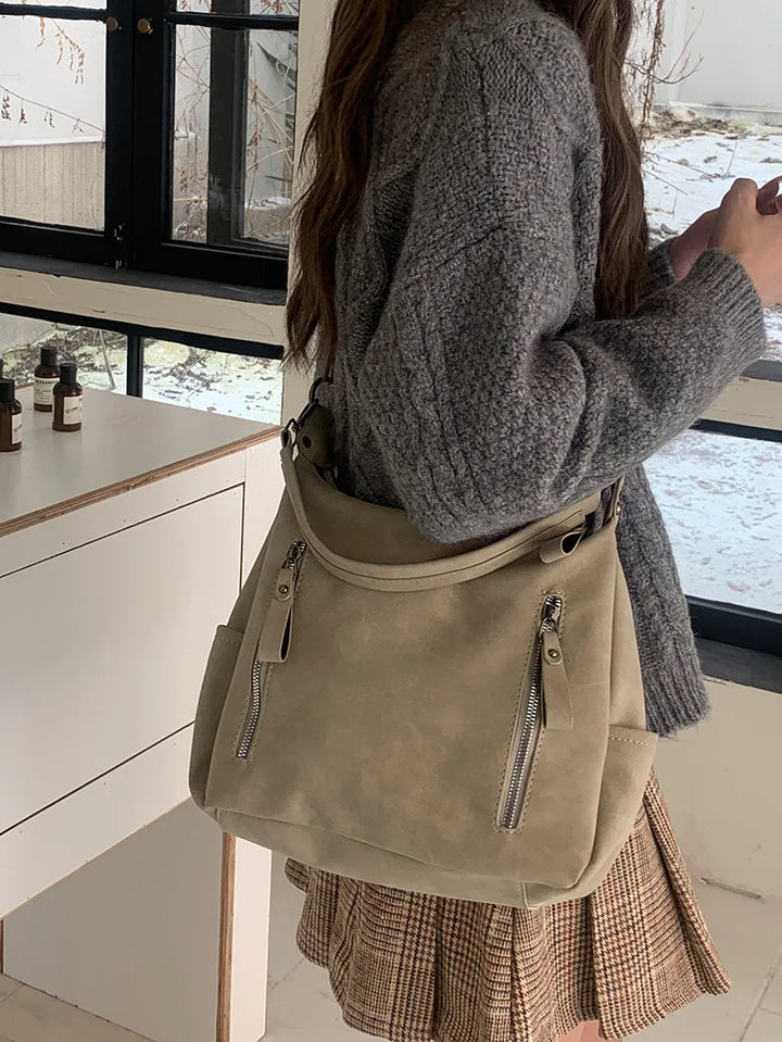 Bag with retro-style faux leather design