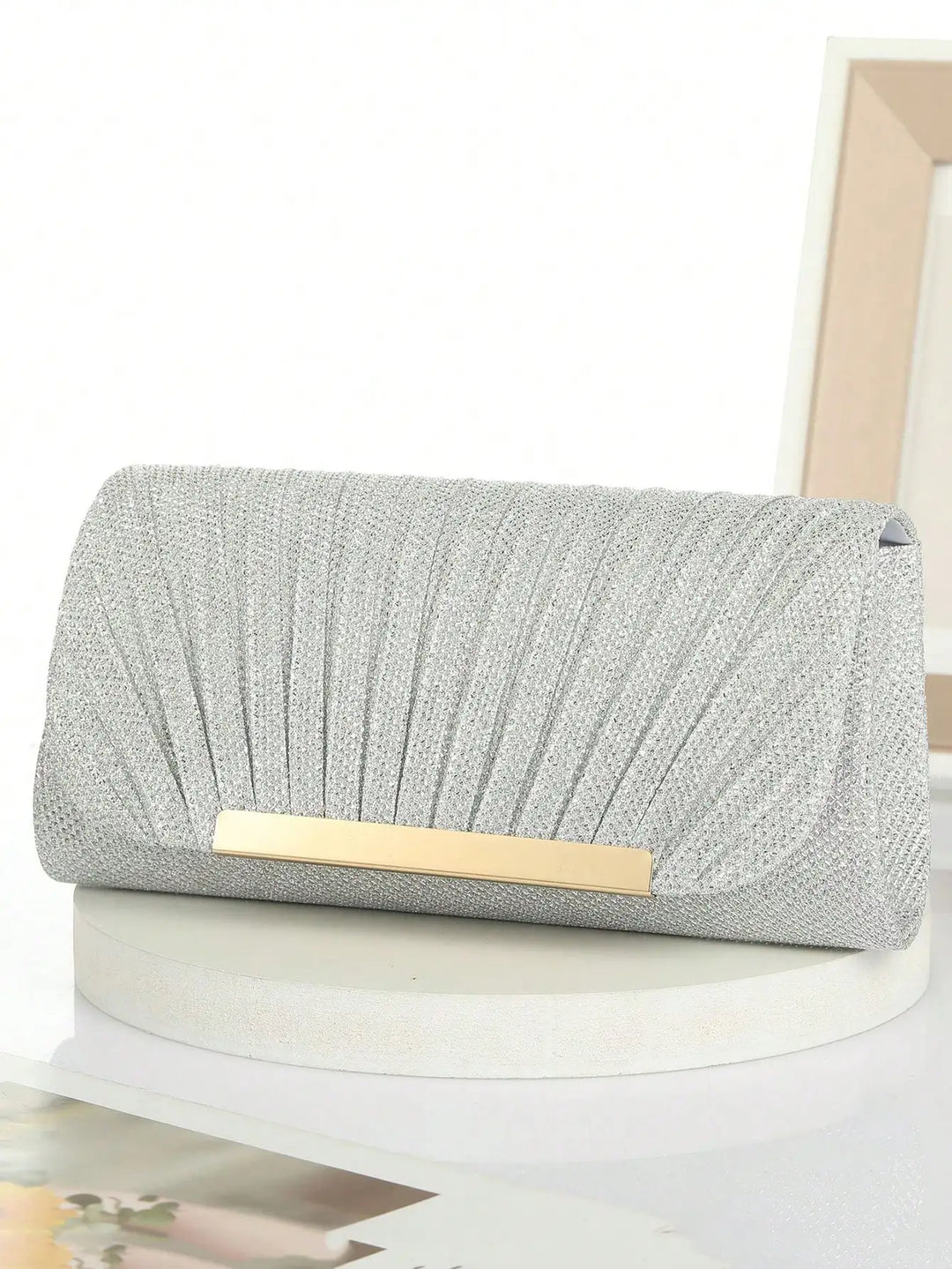 Clutch bag with sparkling studs design