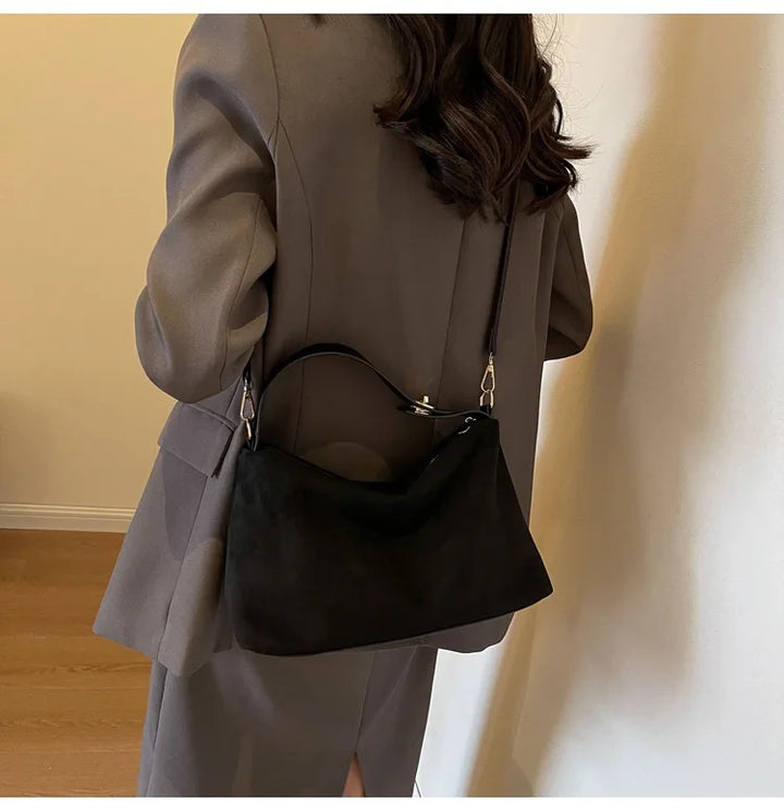 Suede bag with classic design