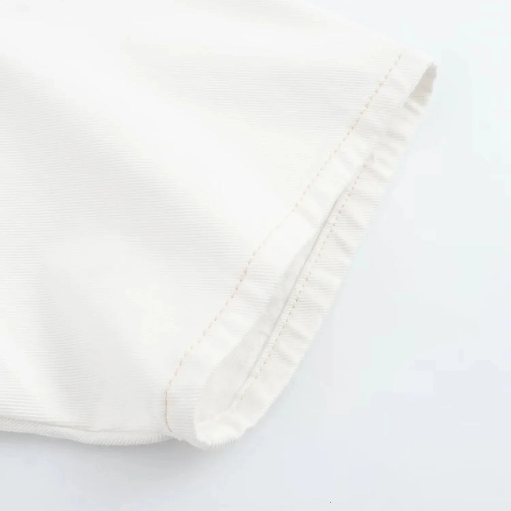 חליפת דנים שני חלקים לבנה מכנס חצאית ובלייזר מכופתר צווארון פולו  -  ג'נסיס