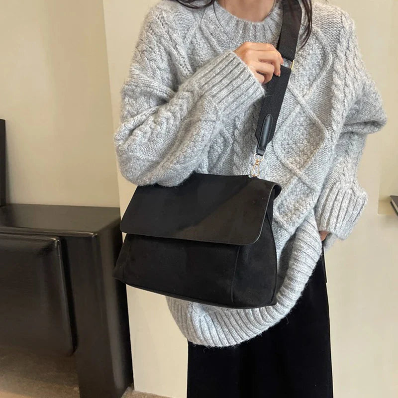 Suede bag with retro design
