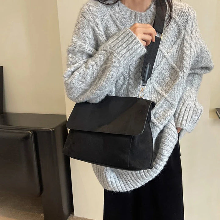 Suede bag with retro design