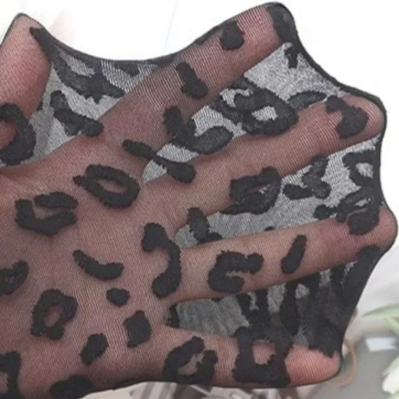 Sheer tights with a leopard print design