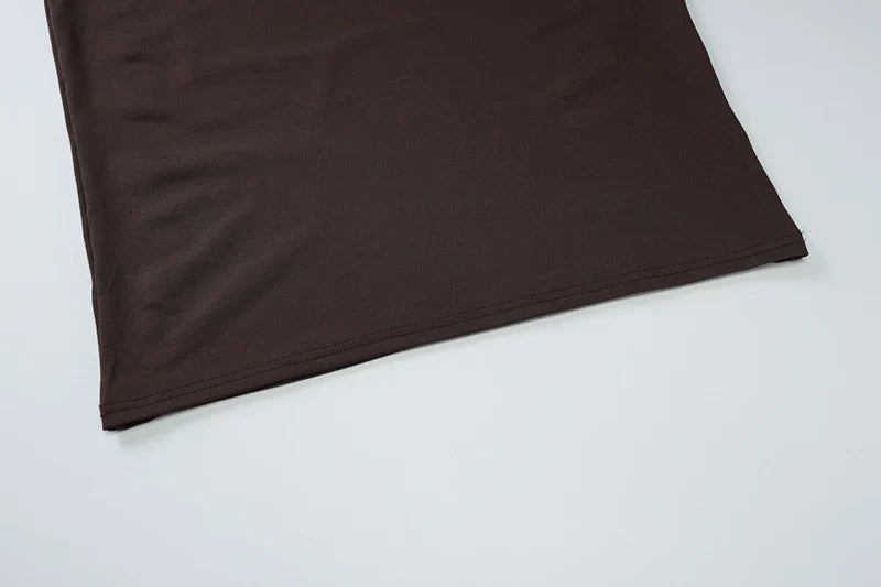 סט שני חלקים חולצת טופ בעיצוב קרוס גולף וחצאית מקסי בעיצוב קרוס בבטן - מורנה