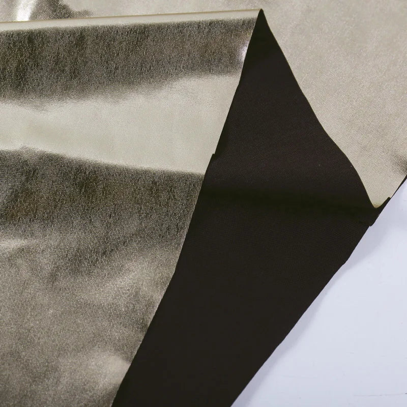 שמלת מקסי בגוון ברונזה מטאלי בעיצוב קשירה בכתפיות גב פתוח - ננסי