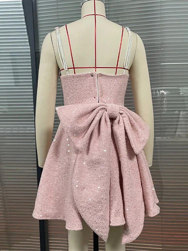 שמלת מיני פייטים בגזרת A בעיטור פפיון בגב - Alayna