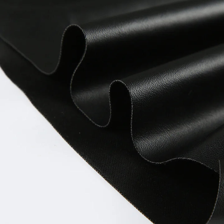 Faux leather top with asymmetrical design - Kami