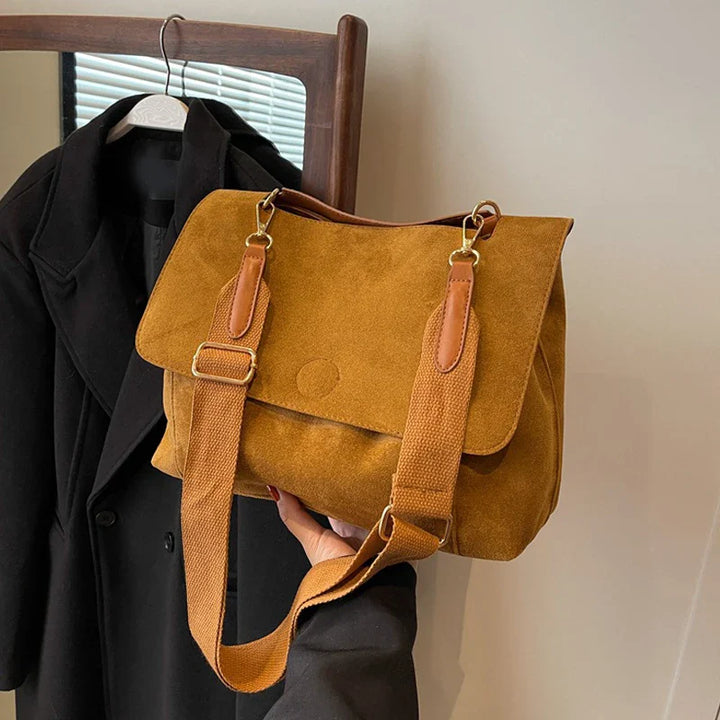 Suede bag with retro design