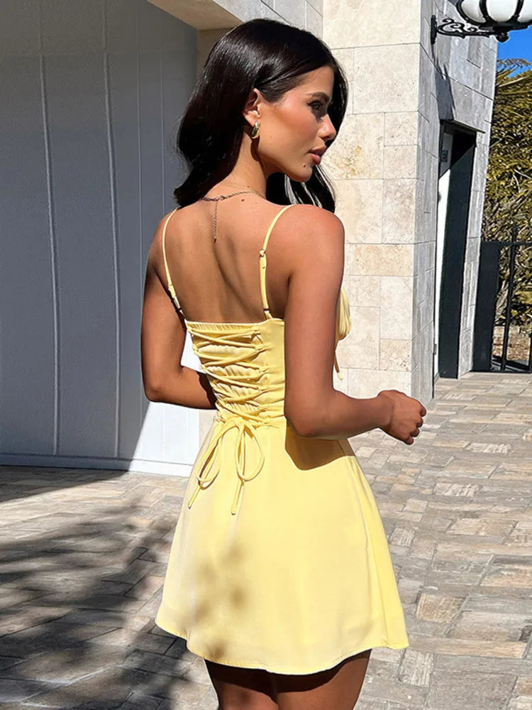 שמלת מיני בגזרת A קשירה בגב להצמדה במותן - נאלה