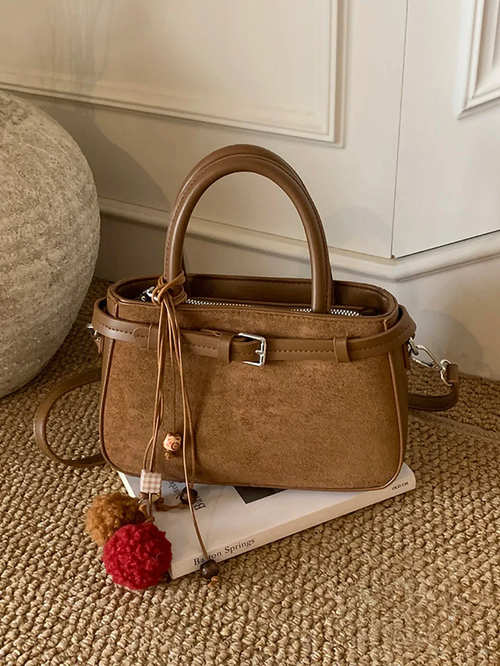 Suede bag with retro design + accessories