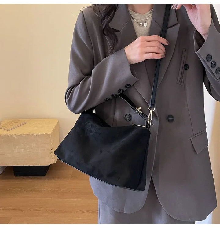 Suede bag with classic design