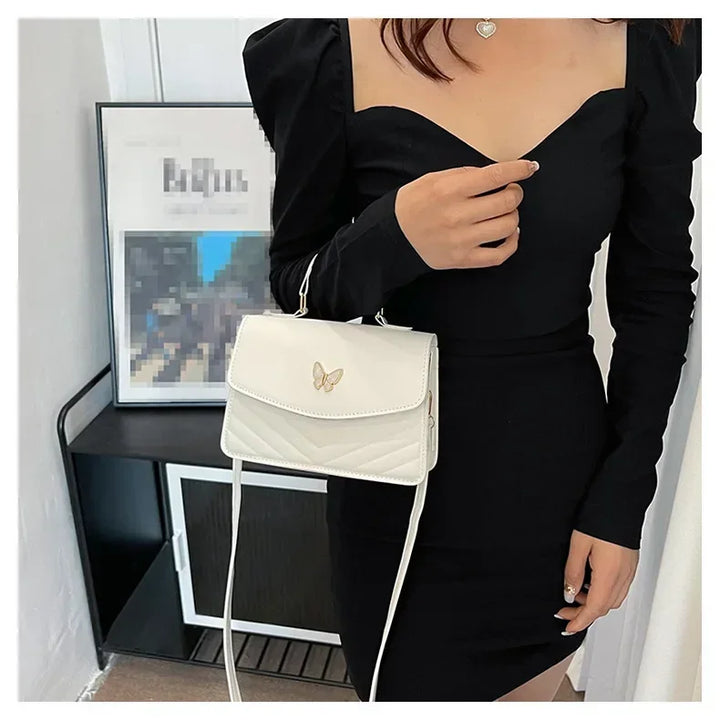 Faux leather bag with butterfly decoration