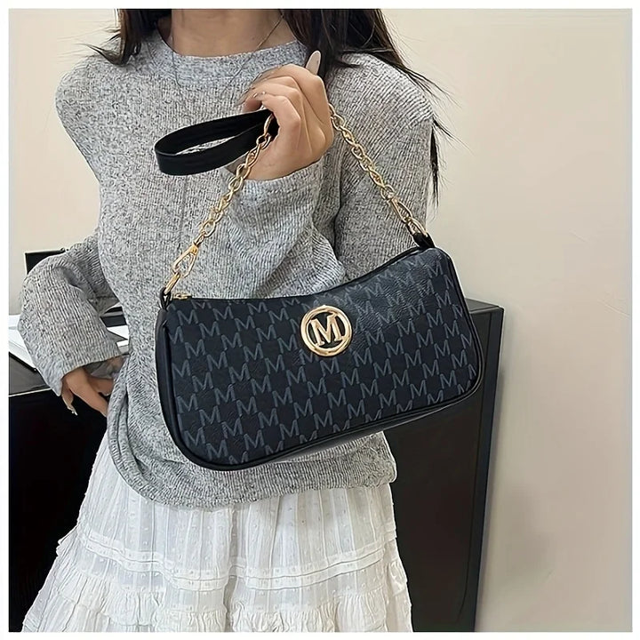 Handbag with M design