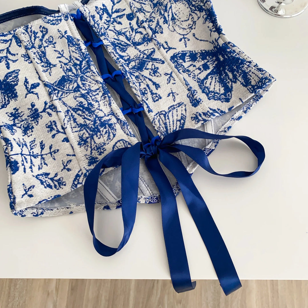 Corset with flower and butterfly design