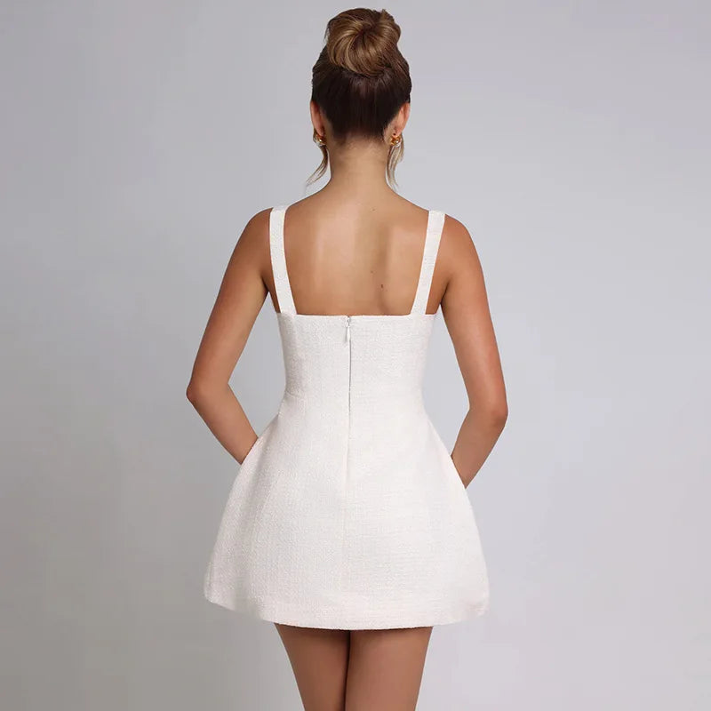 שמלת מיני בד ארוג בגזרת A בעיטור כיסים - מילי