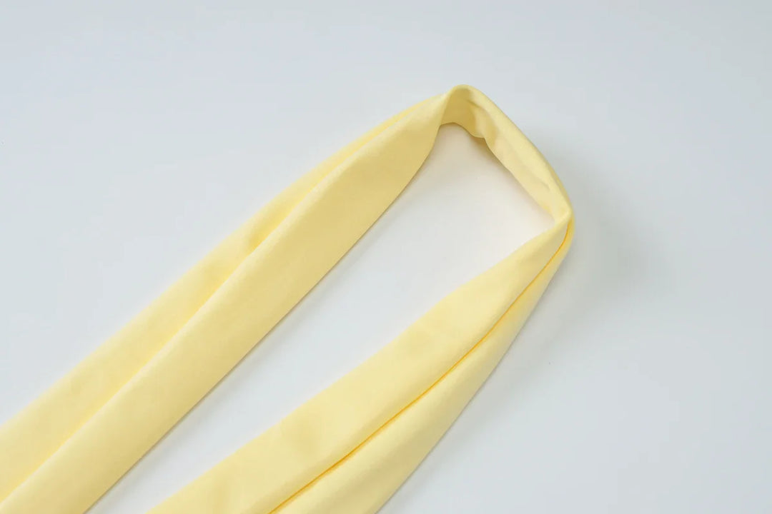 Elegant maxi dress with a slit design and a scarf decoration - RONA LI