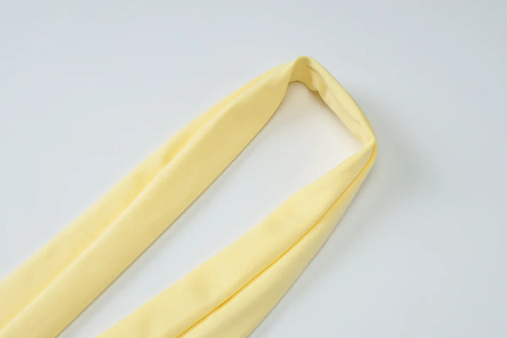 Elegant maxi dress with a slit design and a scarf decoration - RONA LI