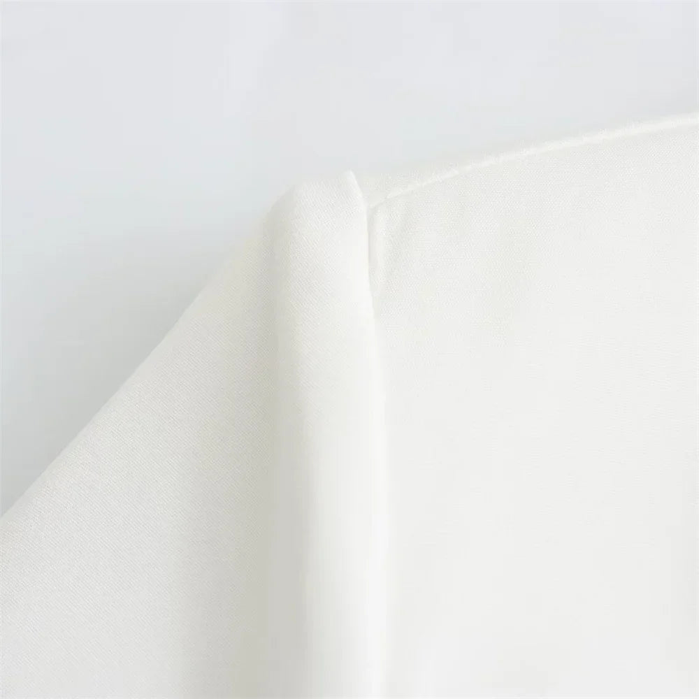 שמלת מיני מחויטת בעיצוב פתחים וחגורה בגב - דבי