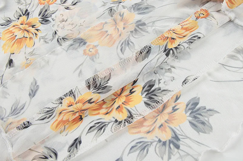 שמלת מיני שיפון פרחונית מלמלה - מרי לין