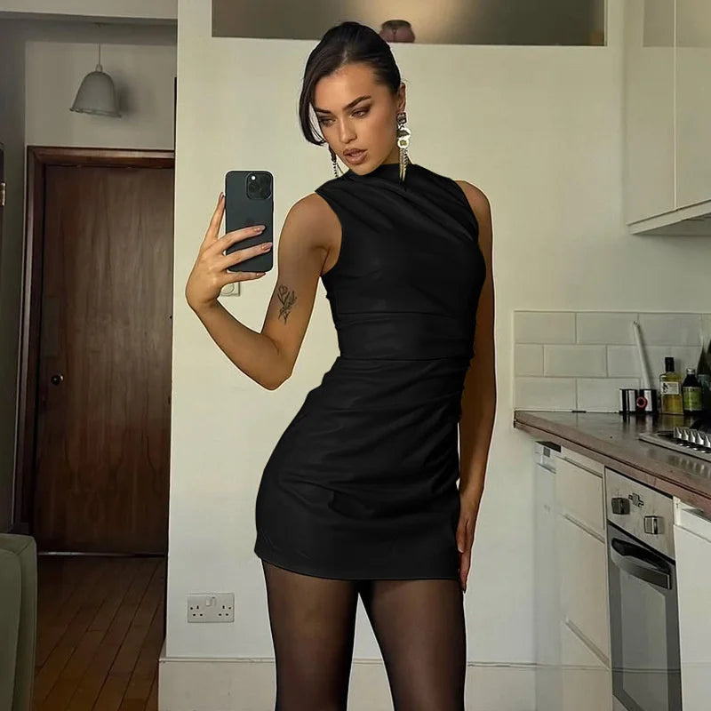 Faux leather mini dress with pleats - SIERA