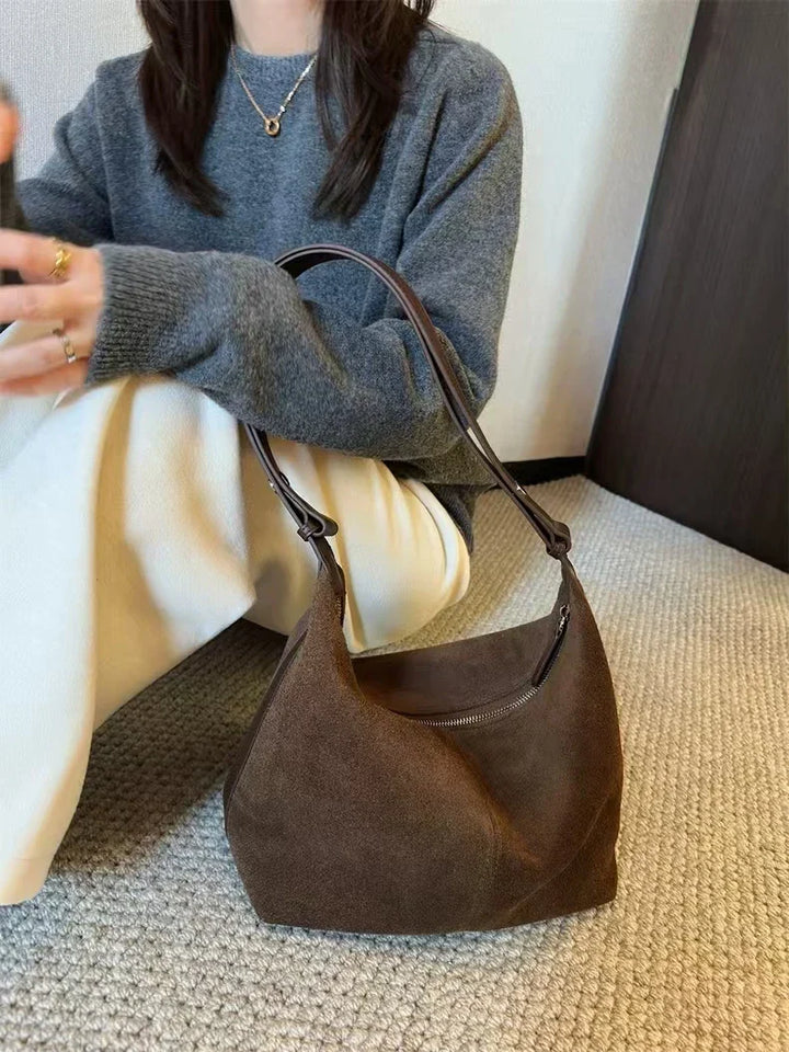 Suede bag with classic design