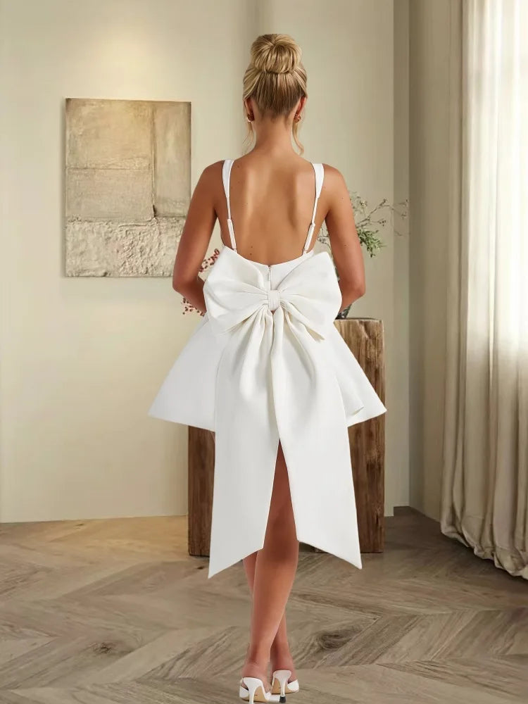 שמלת מיני בגזרת A בעיטור פפיון - אמה