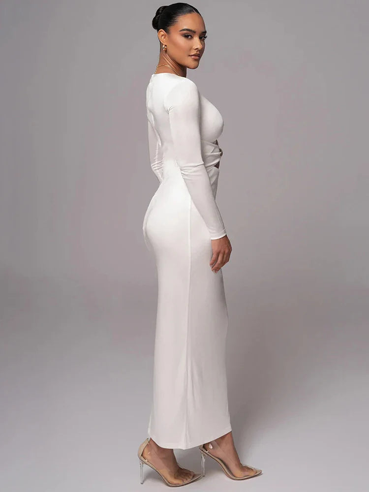 שמלת מקסי צמודה בד מחטב ומחמיא בעיצוב פתחים ואבזמים - לאורין