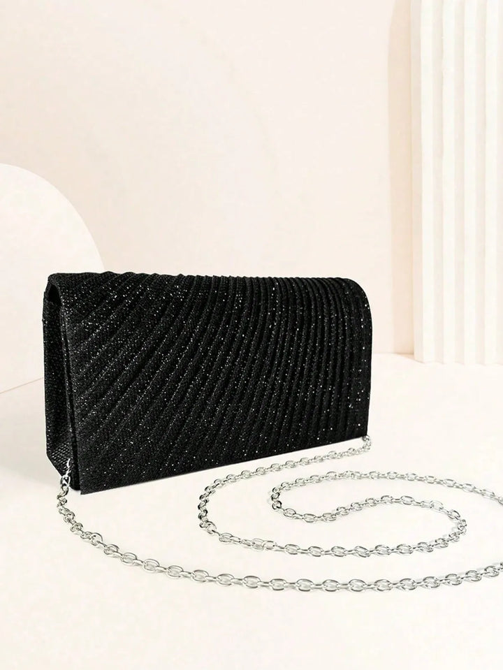 Clutch bag with sparkling studs and chain strap design