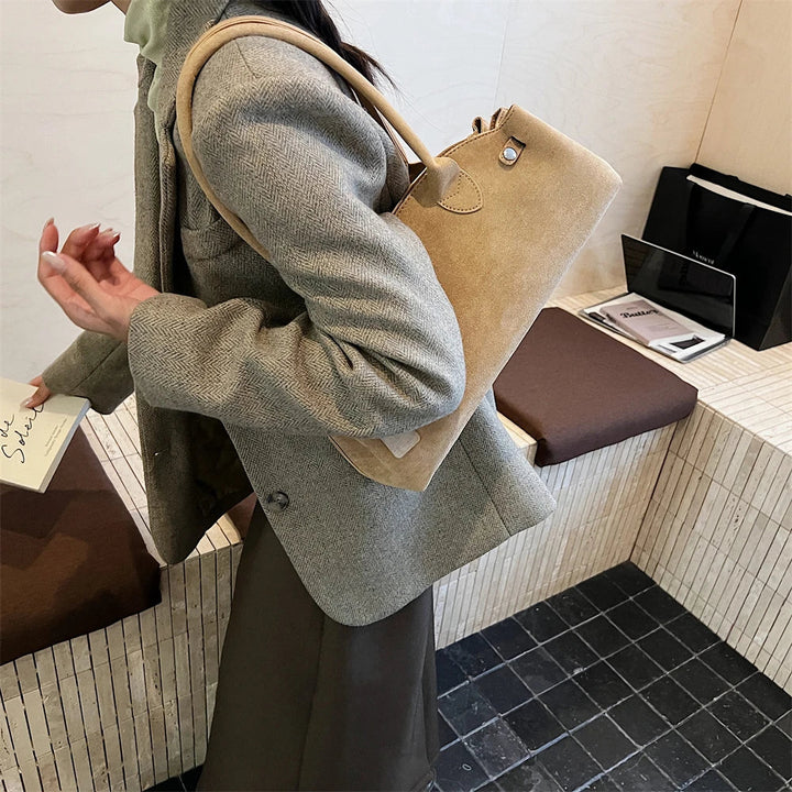 Suede bag with retro design