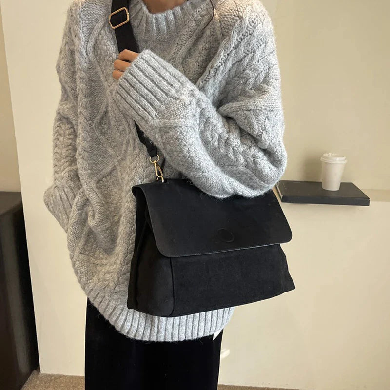 Suede bag with retro design