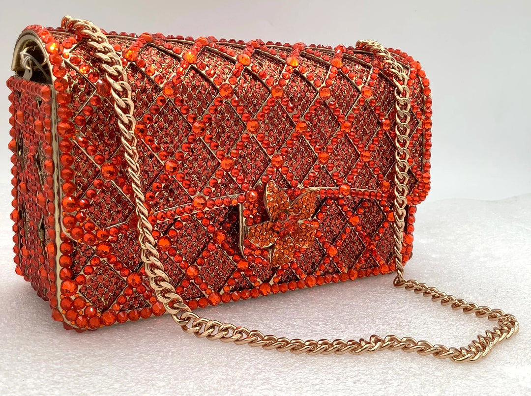 Sequin bag with diamond pattern and flower decoration