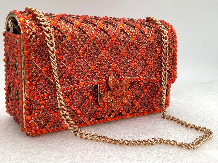 Sequin bag with diamond pattern and flower decoration