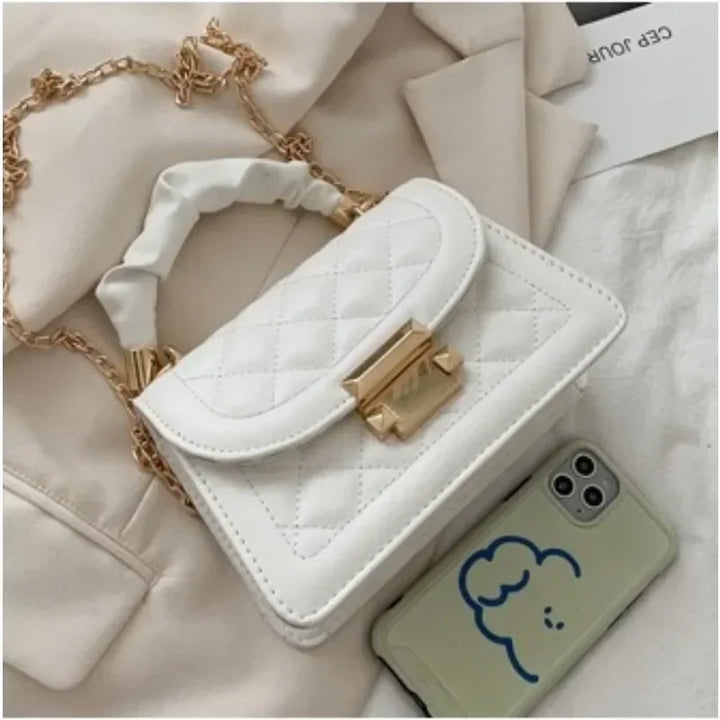 Faux leather handbag combined with chain strap