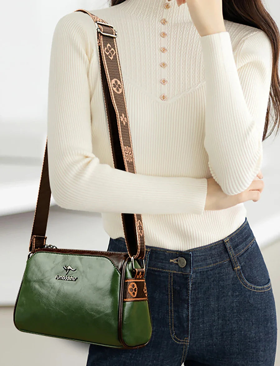 Faux leather bag with strap design