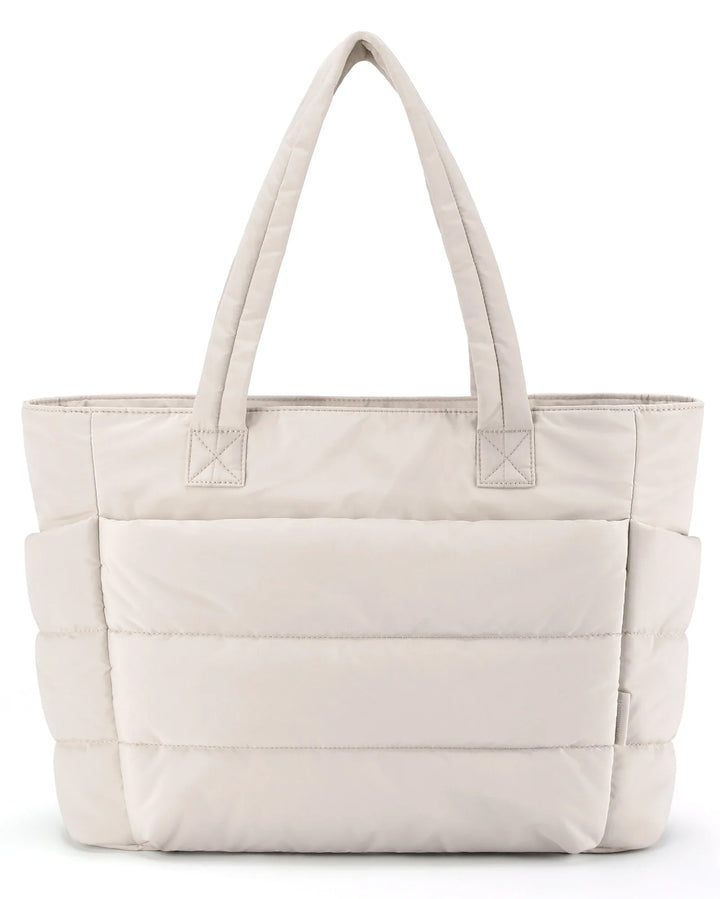 Padded carrying bag with large storage compartment