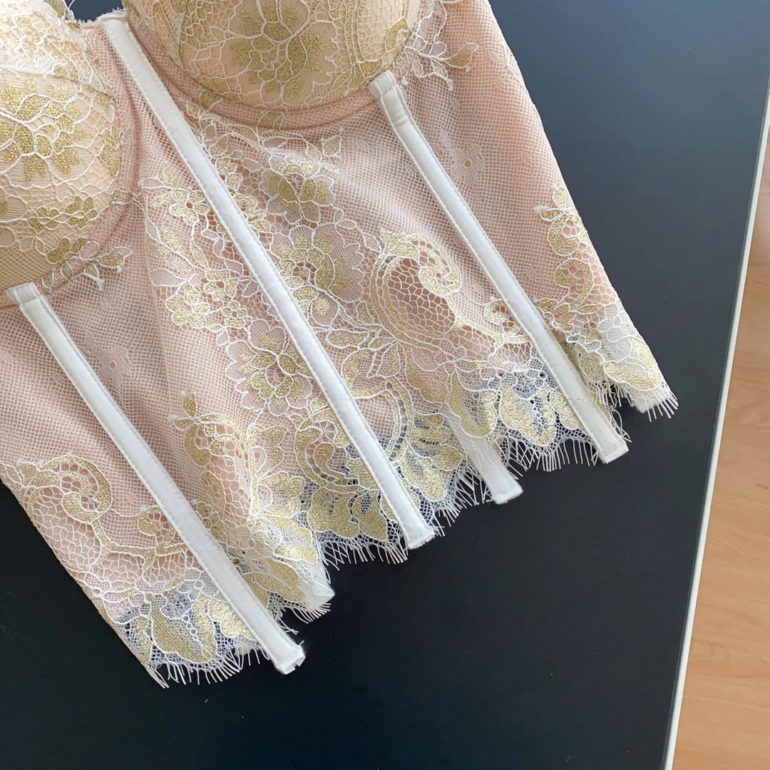 Lace corset with pin closure