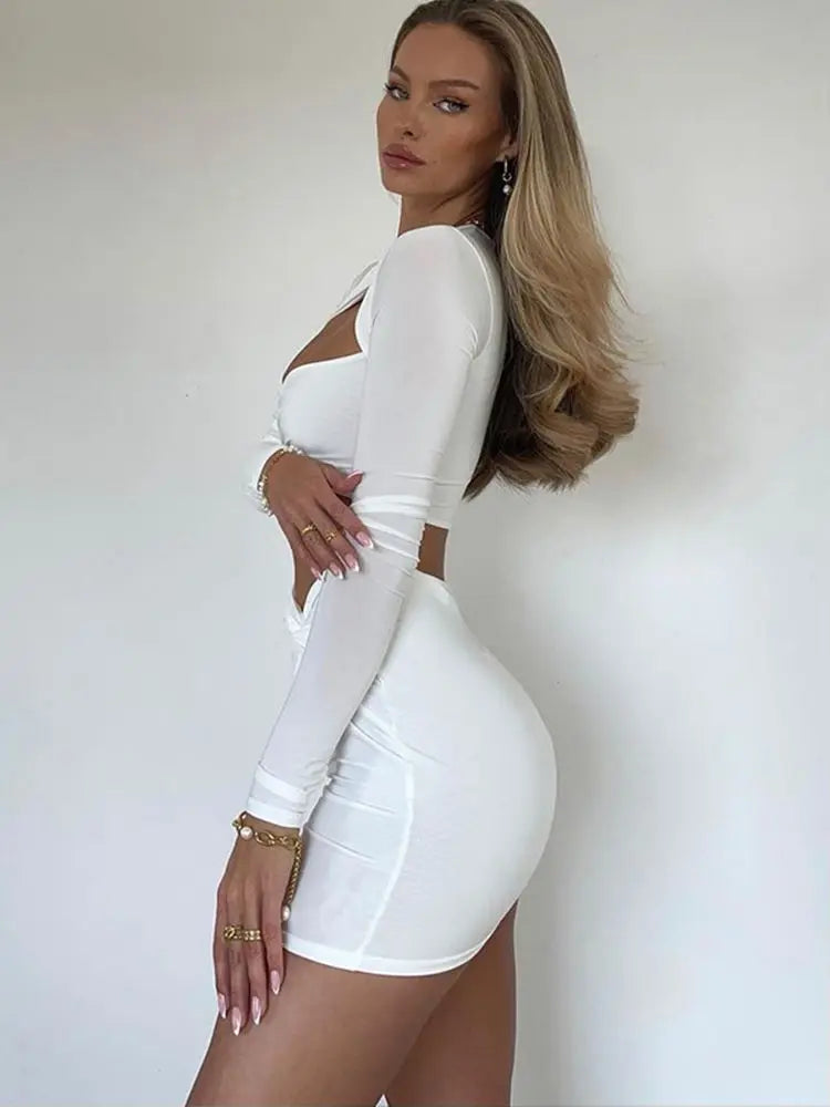 חליפת שני חלקים צמודה טופ פתחים וחצאית מיני כיווצים - שיילה