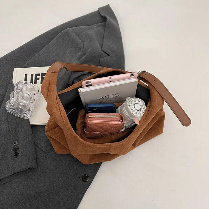 Suede bag with retro design
