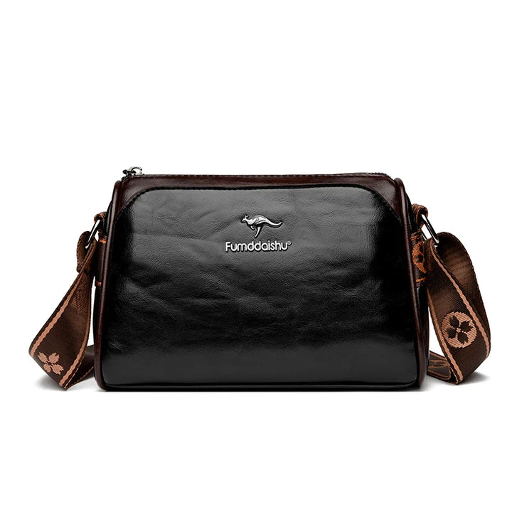 Faux leather bag with strap design