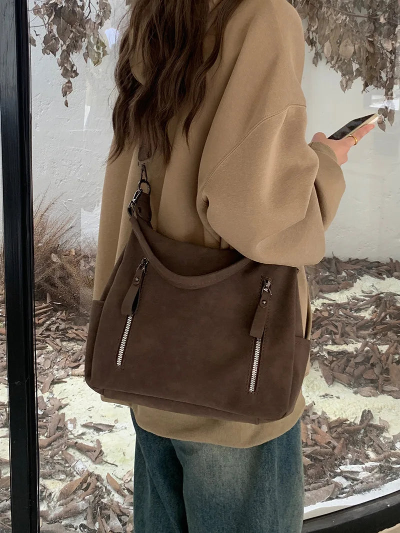 Bag with retro-style faux leather design