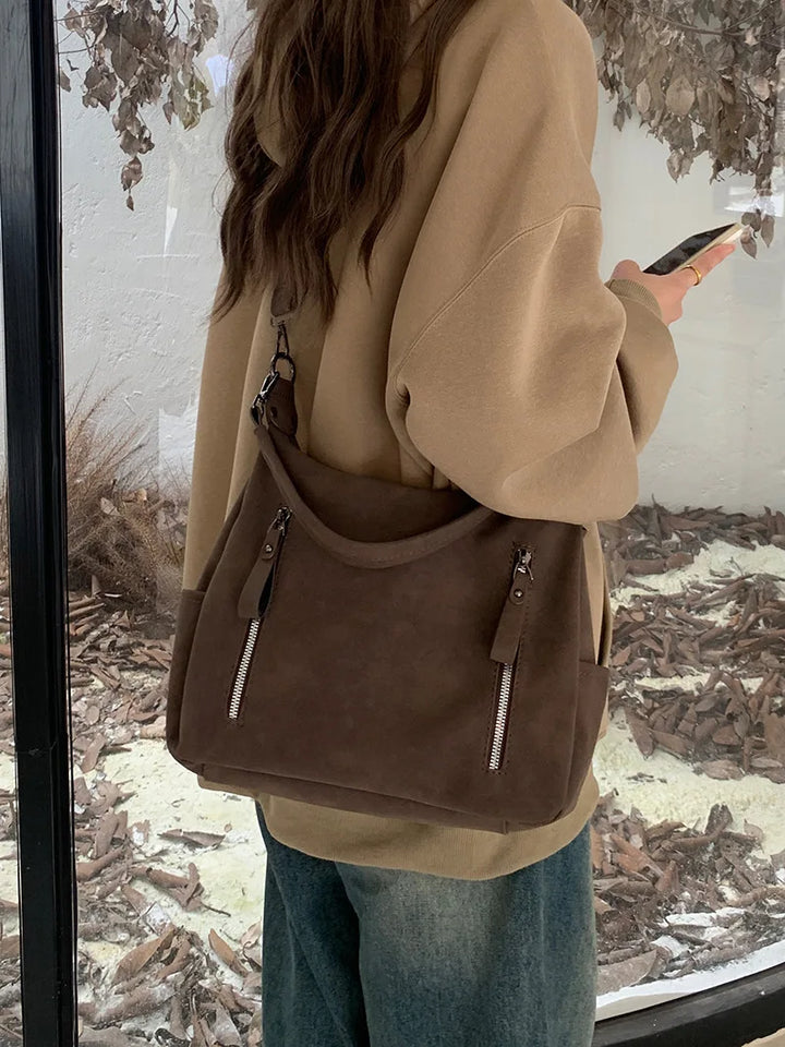 Bag with retro-style faux leather design