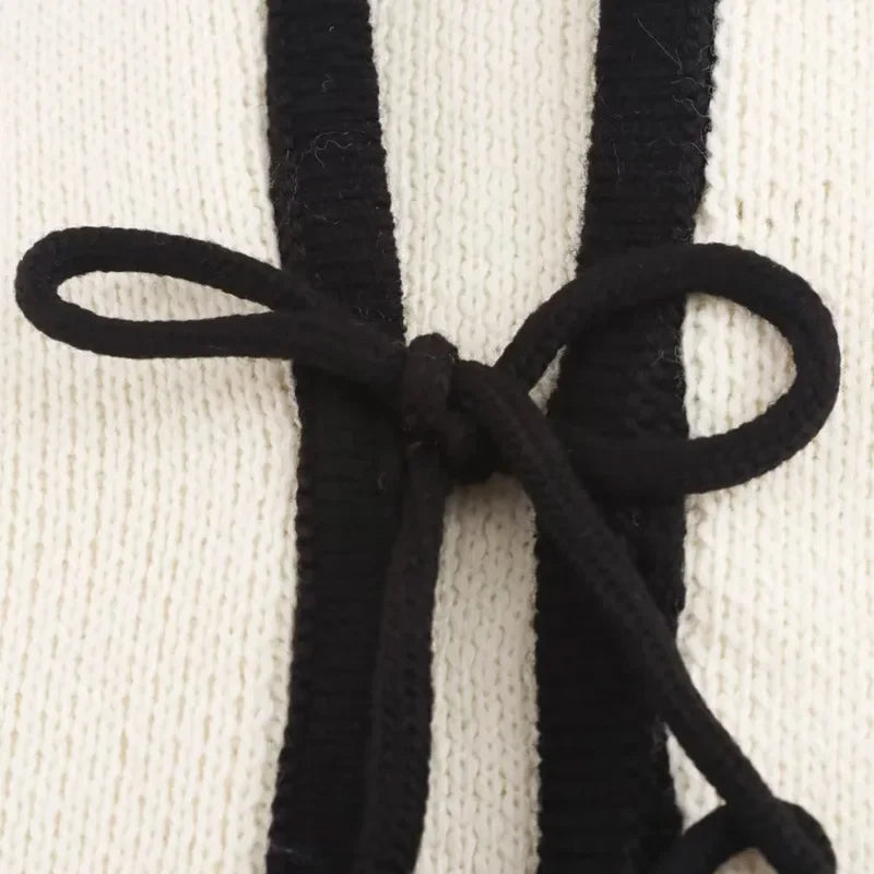 סוודר קשירות - מונה