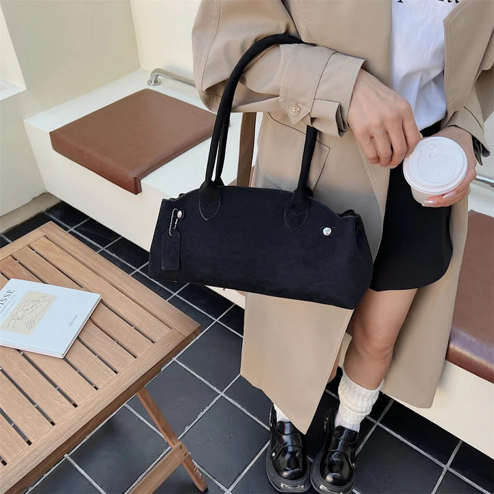 Suede bag with retro design