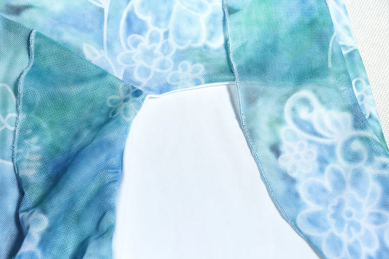 סט שני חלקים בהדפס טרופי טופ וחצאית מקסי מלמלה בעיצוב שסע - MAYA