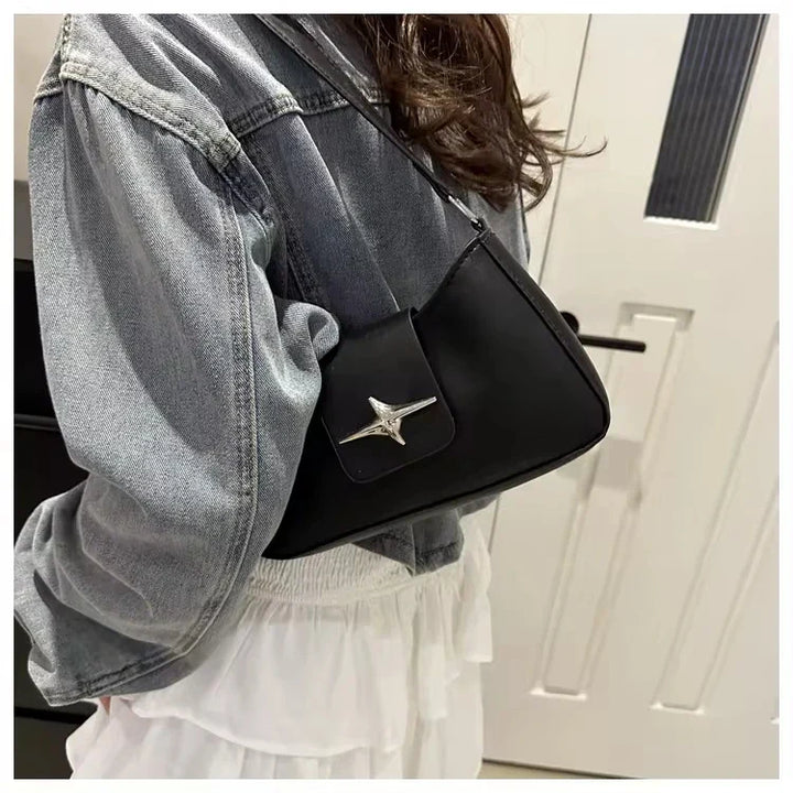 Faux leather bag with buckle design
