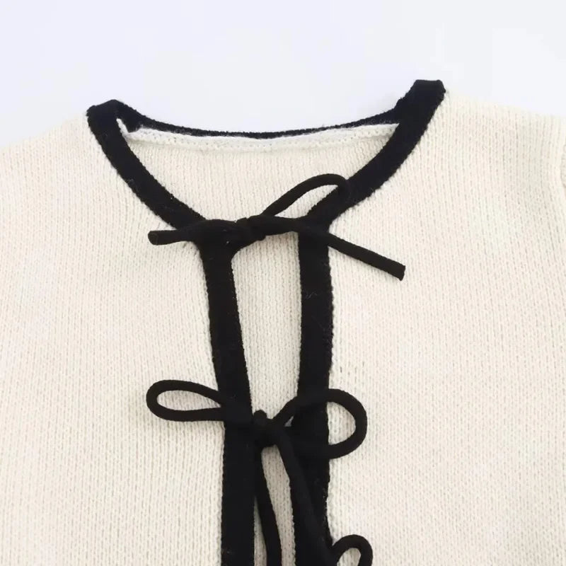 סוודר קשירות - מונה